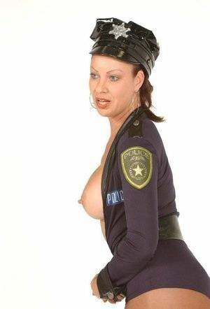 Playful MILF Vanessa Videl wears her slutty police uniform and shows off her on girlsabc.com