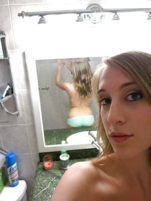 Smiley amateur Cadence Lux stripping and picturing herself in the bath on girlsabc.com