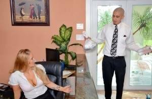 Clothed office worker unveiling big tits while fucking co-worker on girlsabc.com