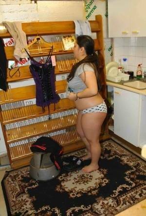 Fat amateur Kimberly Scott changes into lingerie inside a XXX store on girlsabc.com