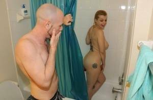 Naked girl Nadia White pleasures her guy's cock while taking a shower on girlsabc.com
