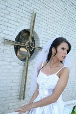 MILF babe in bride's dress Jennifer Dark spreading pussy on girlsabc.com