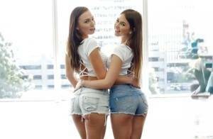 Teen pornstars Aidra Fox and Riley Reid suck each others lesbo tits and twats on girlsabc.com