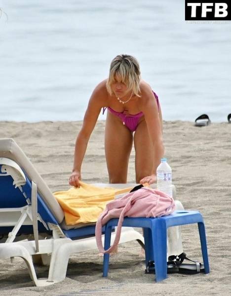 Ashley Roberts Enjoys the Beach on Holiday in Marbella on girlsabc.com