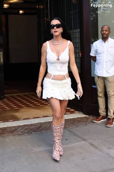 Katy Perry Displays Her Sexy Figure in a White Outfit (70 Photos) on girlsabc.com