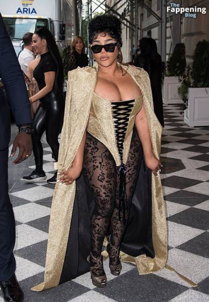 Lil’ Kim Flashes Her Areola as She Attends the Christian Siriano Fashion Show (32 Photos) - Usa on girlsabc.com