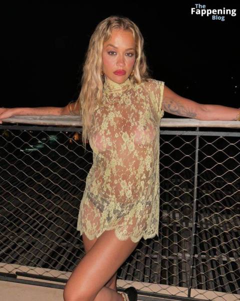 Rita Ora Shows Off Her Nude Boobs While Posing in a Sheer Dress (2 Photos) on girlsabc.com